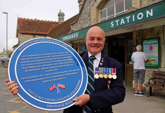 SRT chairman Frank Roberts with the 80th anniversary plaque